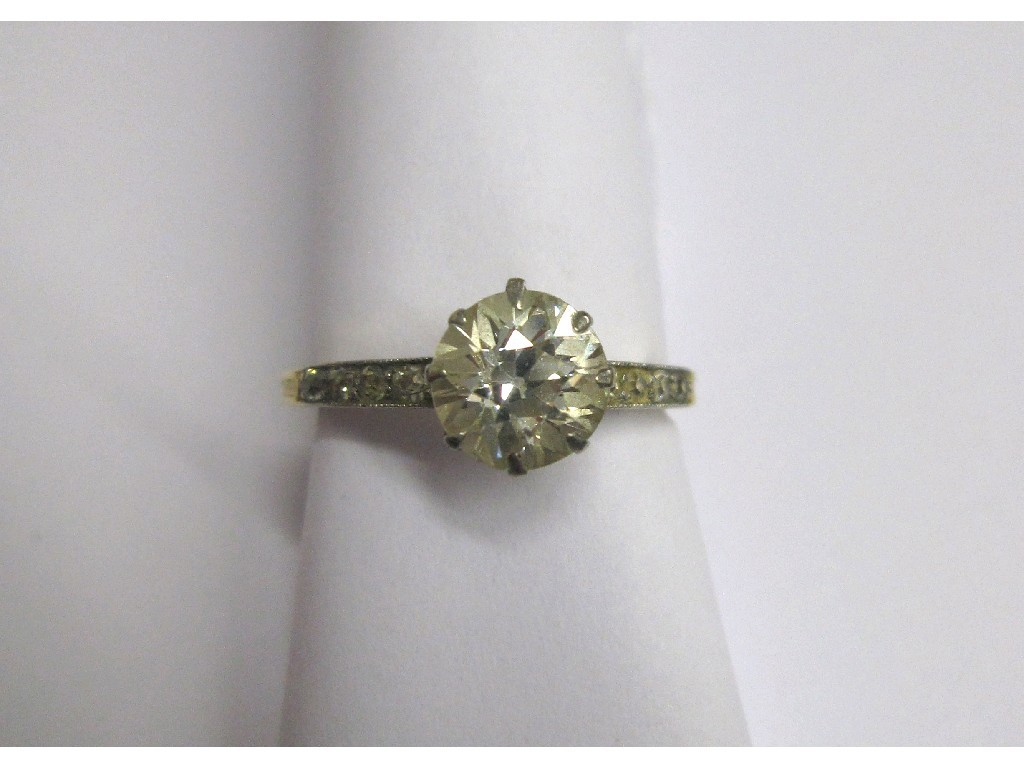 Appraisal: Eighteen carat gold and platinum diamond solitaire ring with rose