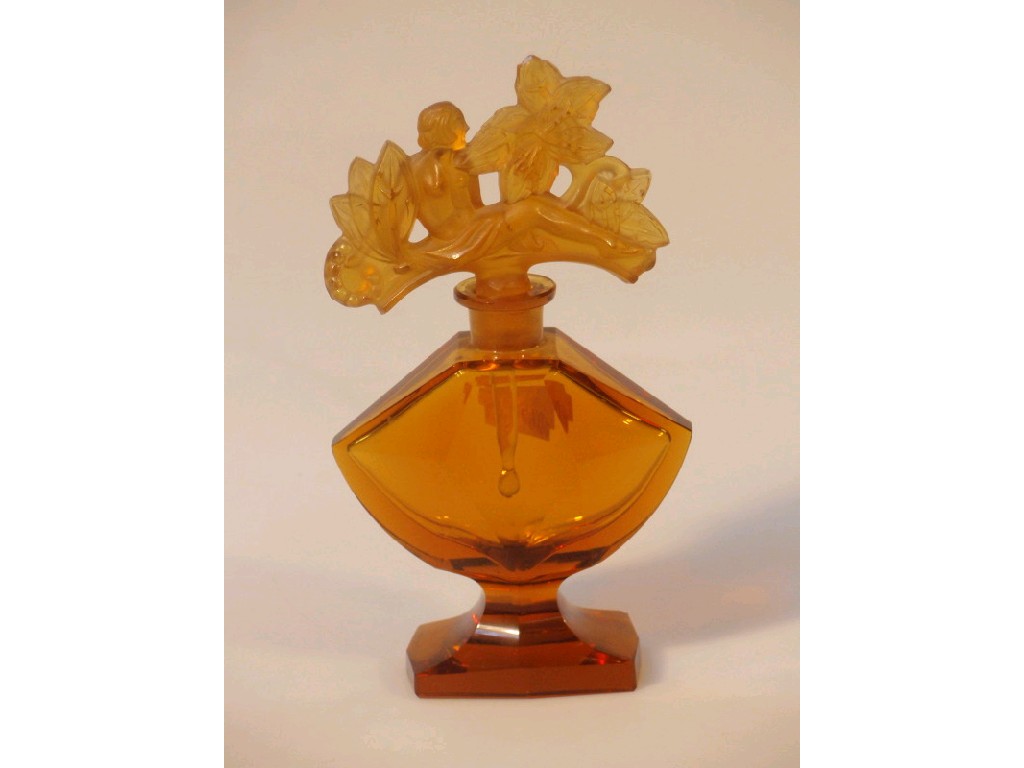 Appraisal: A French Art Deco style amber glass scent bottle the