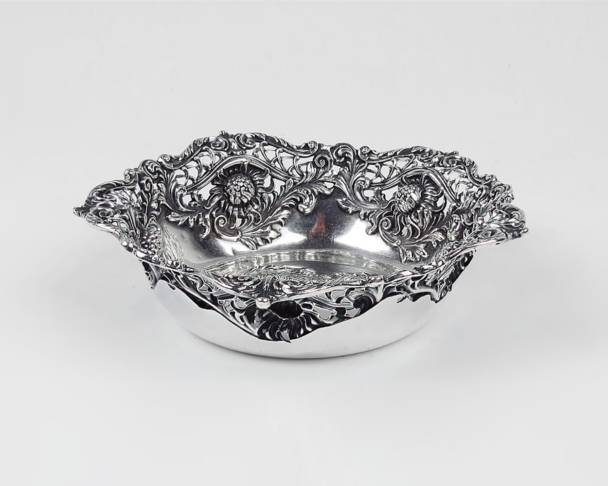 Appraisal: FRANK HERSCHEDE FLORAL REPOUSSE STERLING BOWL Approx Troy ounces Sterling