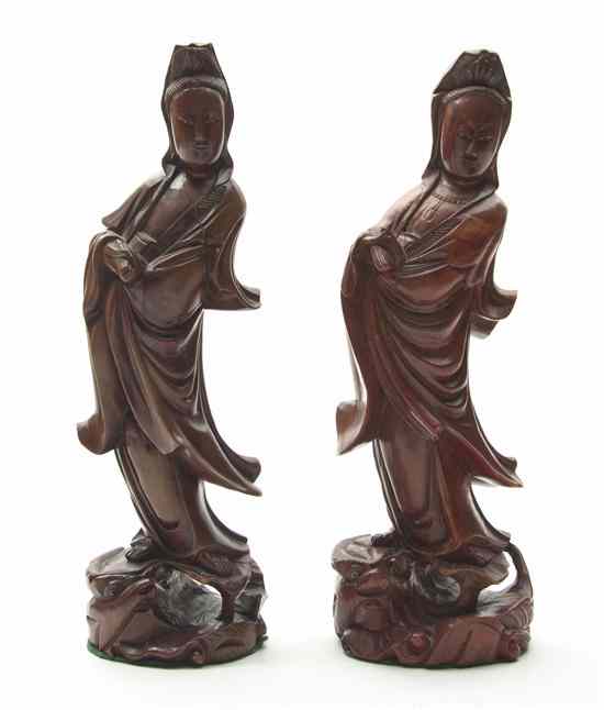 Appraisal: A Near Pair of Chinese Carved Hardwood Figures of Guanyin