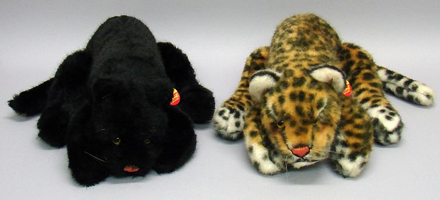 Appraisal: Pair of reclining plush animals L Spotted Leopard and L