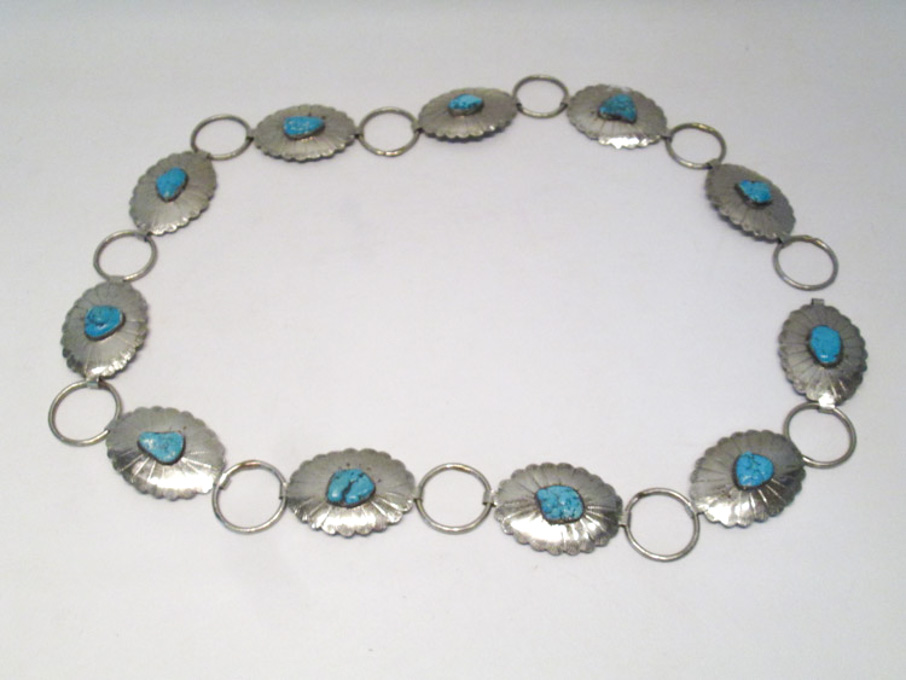 Appraisal: NATIVE AMERICAN SILVER CONCHO BELT measuring inches in length with