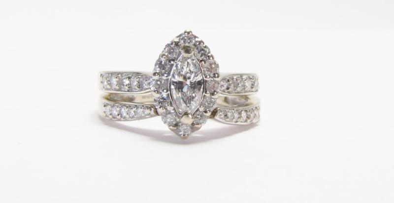 Appraisal: A K white gold diamond wedding set by MWI engagement