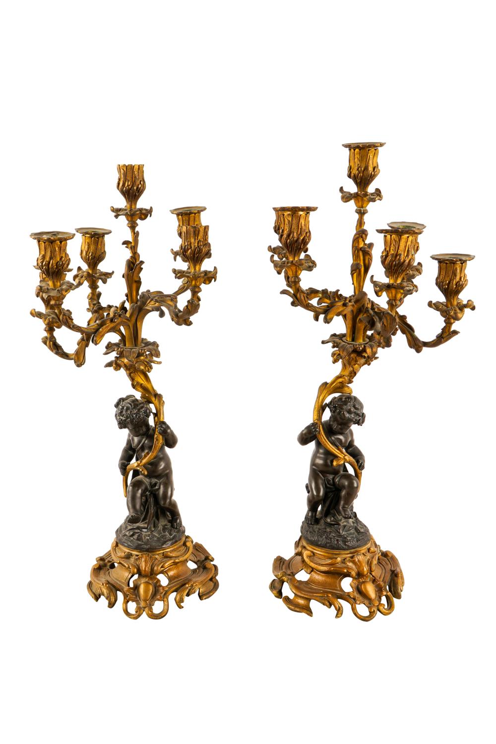 Appraisal: PAIR OF ROCOCO STYLE FIGURAL CANDELABRAbronze with gilt and dark