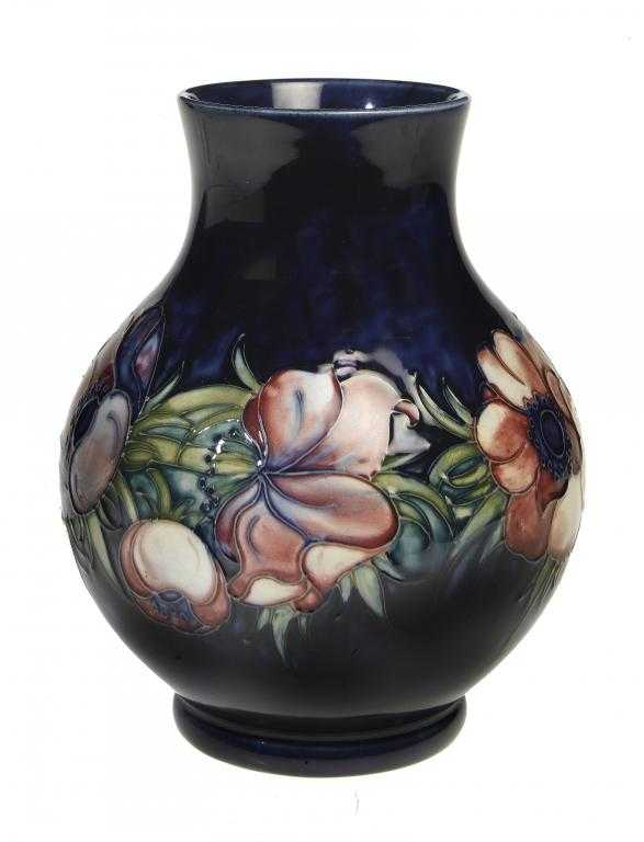 Appraisal: A MOORCROFT ANEMONE VASE DESIGNED BY WALTER MOORCROFT cm h