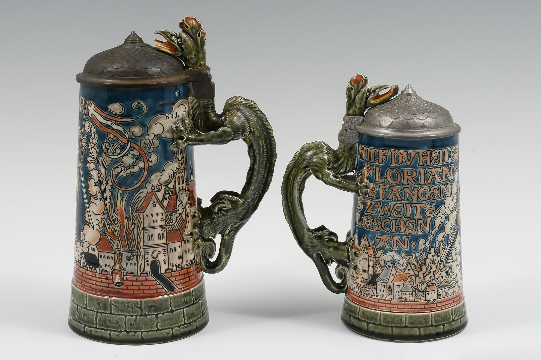 Appraisal: PC METTLACH FIGURAL STEINS Comprising - Mettlach Stein St Florian