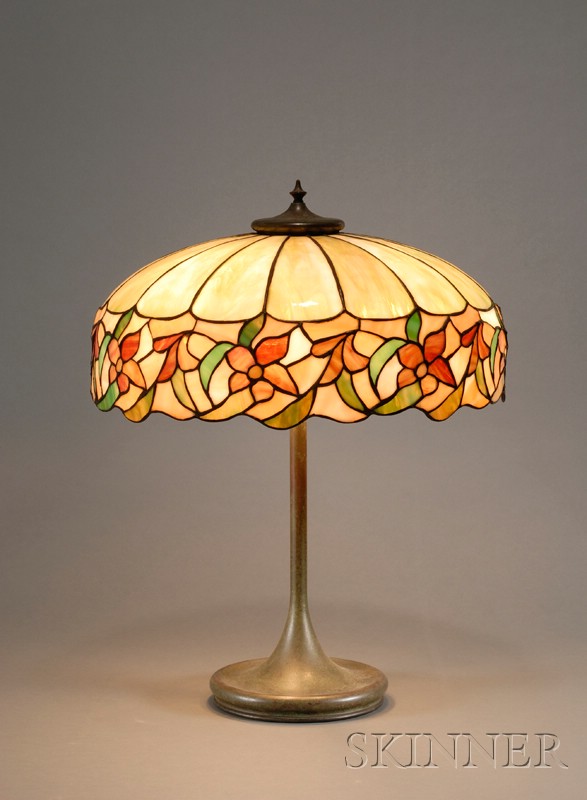 Appraisal: American Slag Glass and Cast-iron Table Lamp c the shade