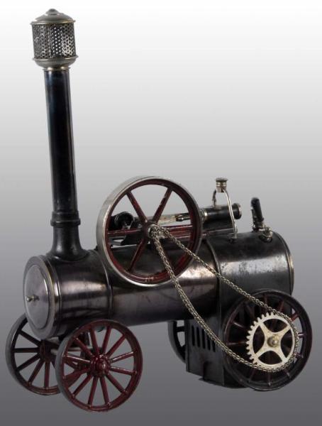 Appraisal: Bing Bing Traction Steam Engine Toy Description This early engine