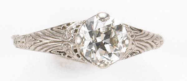 Appraisal: A diamond and platinum solitaire ring European-cut weighing an estimated