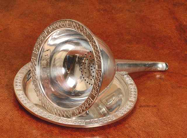 Appraisal: A SILVER WINE FUNNEL with detachable liner and drip tray