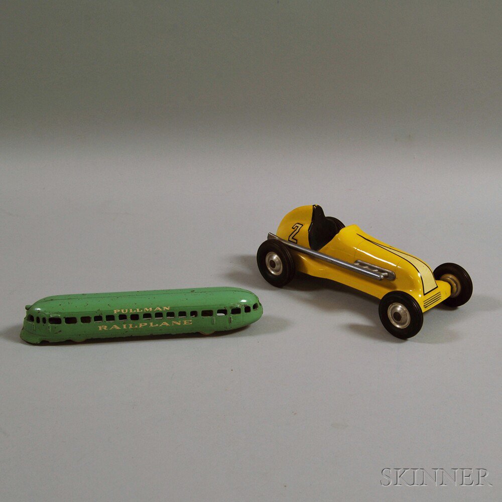 Appraisal: Two Vintage Toy Metal Vehicles a yellow Cox Thimble Drome