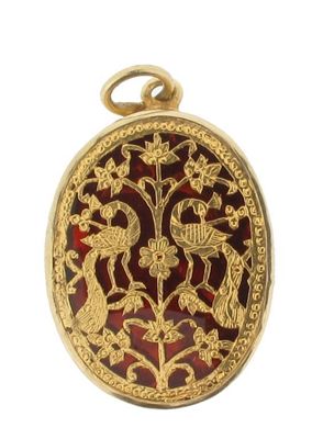 Appraisal: A pertabgarh Indian gold pendant Pierced with peacocks amongst foliage