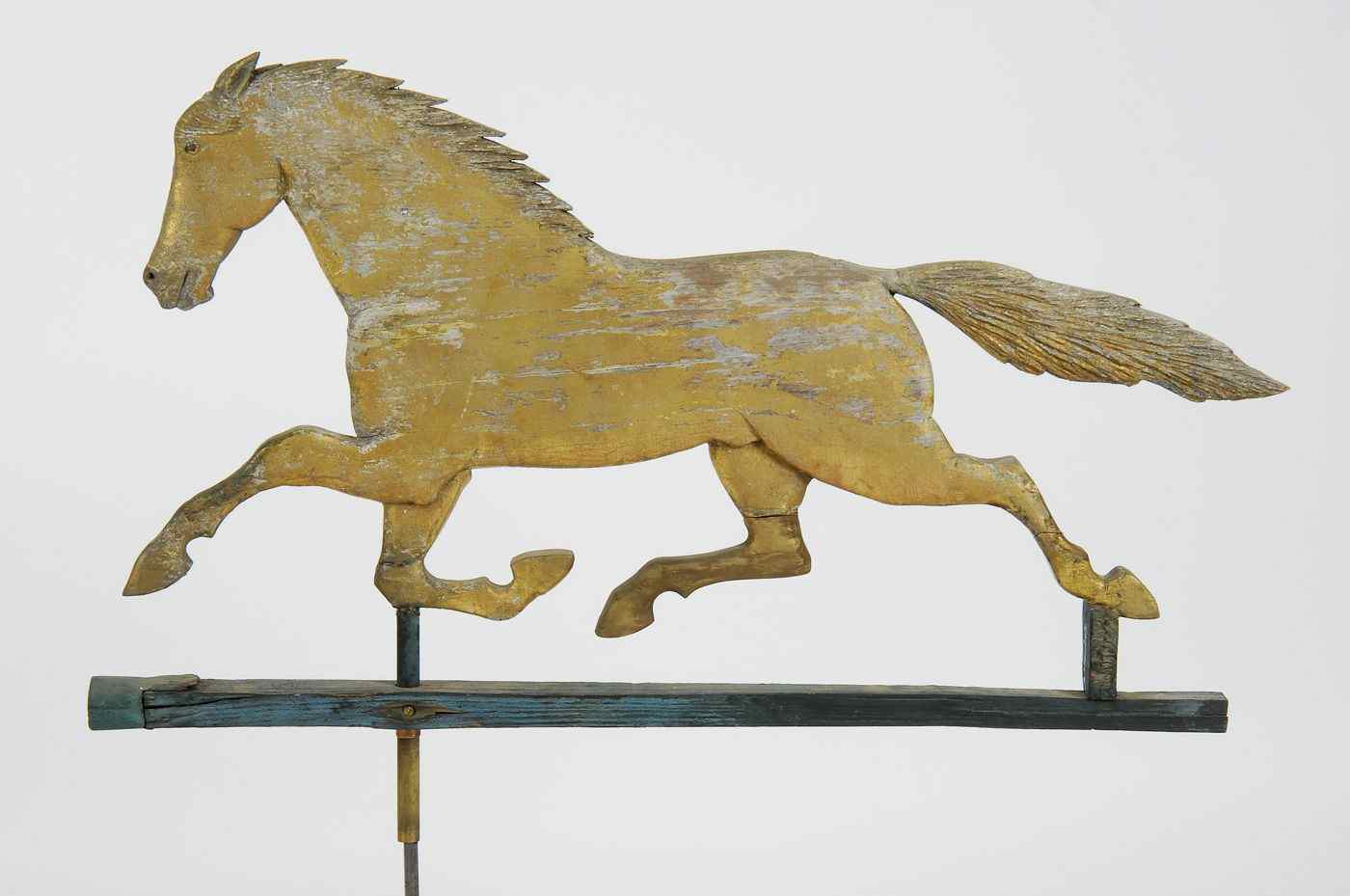 Appraisal: CARVED WOODEN HORSE-FORM WEATHER VANEAmerican th CenturyIn gold paint Height