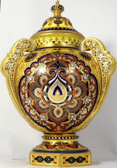 Appraisal: Royal Crown Derby three handled vase and cover richly decorated