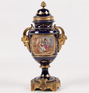 Appraisal: FRENCH SEVRES BRONZE MOUNTED CAPPED URN FRENCH COBALT BLUE GROUND