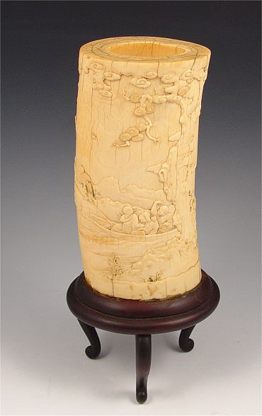 Appraisal: CHINESE CARVED IVORY TUSK Carved with scene of men pulling