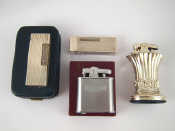 Appraisal: Two Dunhill cigarette lighters one AF together with two Ronson