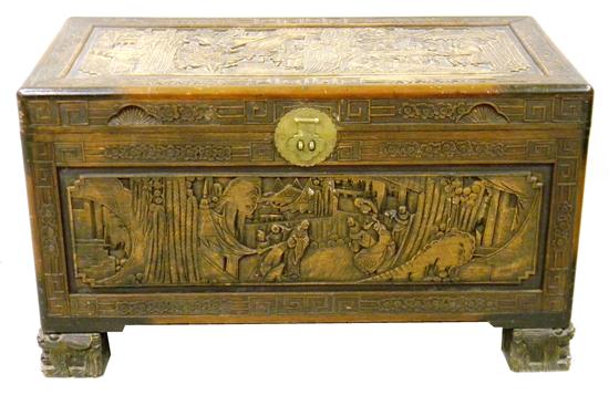 Appraisal: Asian camphor wood chest with intricately carved decoration in relief