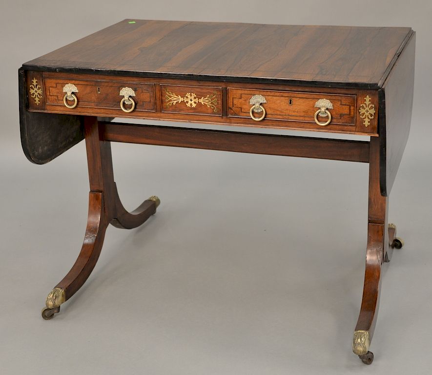 Appraisal: George III rosewood sofa table having drop leaves and brass