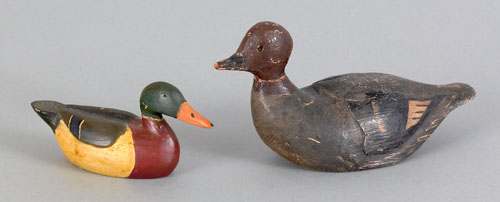 Appraisal: Two miniature duck decoys to include a goldeneye hen ca