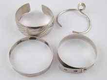 Appraisal: A mixed lot comprising three English hallmarked silver bangles together