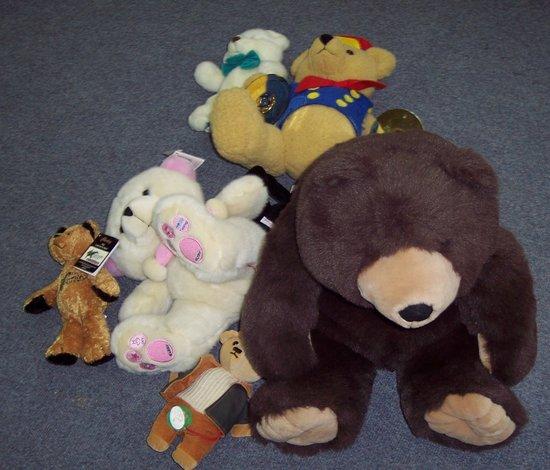 Appraisal: A radio teddy bear together with six further teddy bears