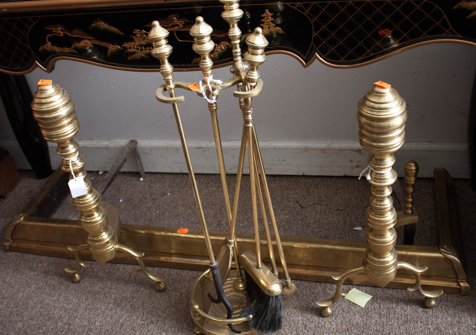 Appraisal: Four fire tools including fender pair of andirons and set