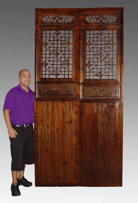 Appraisal: CHINESE CARVED WOOD TEMPLE DOOR Carved and openwork panels Approx