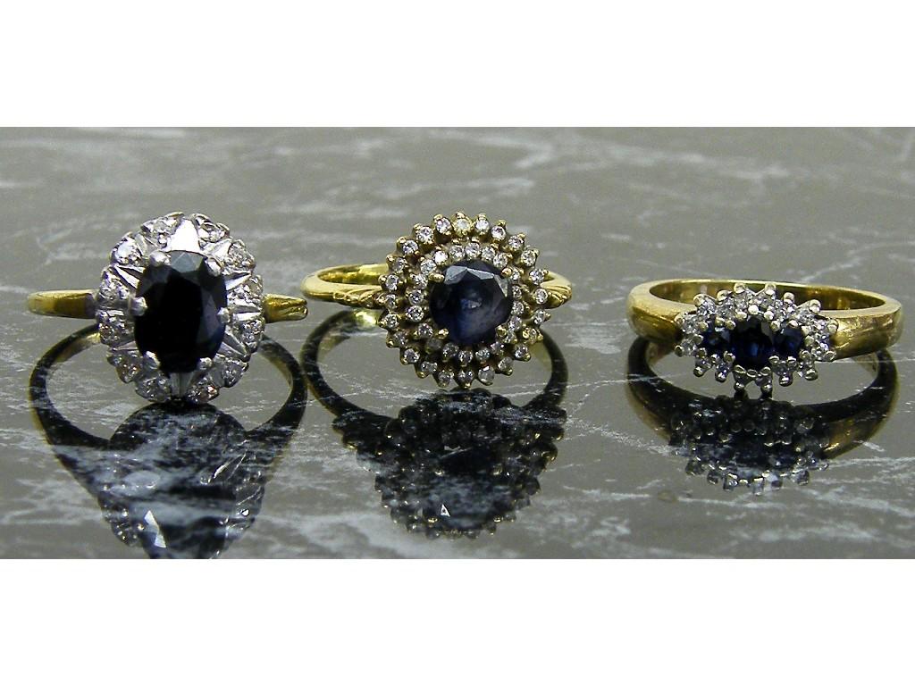 Appraisal: Two ct sapphire and diamond cluster rings gm approx together