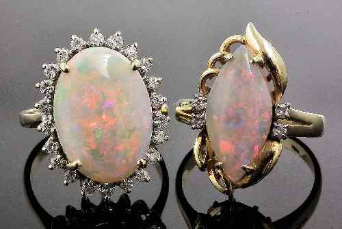 Appraisal: A modern Australian ct gold mounted opal and diamond oval