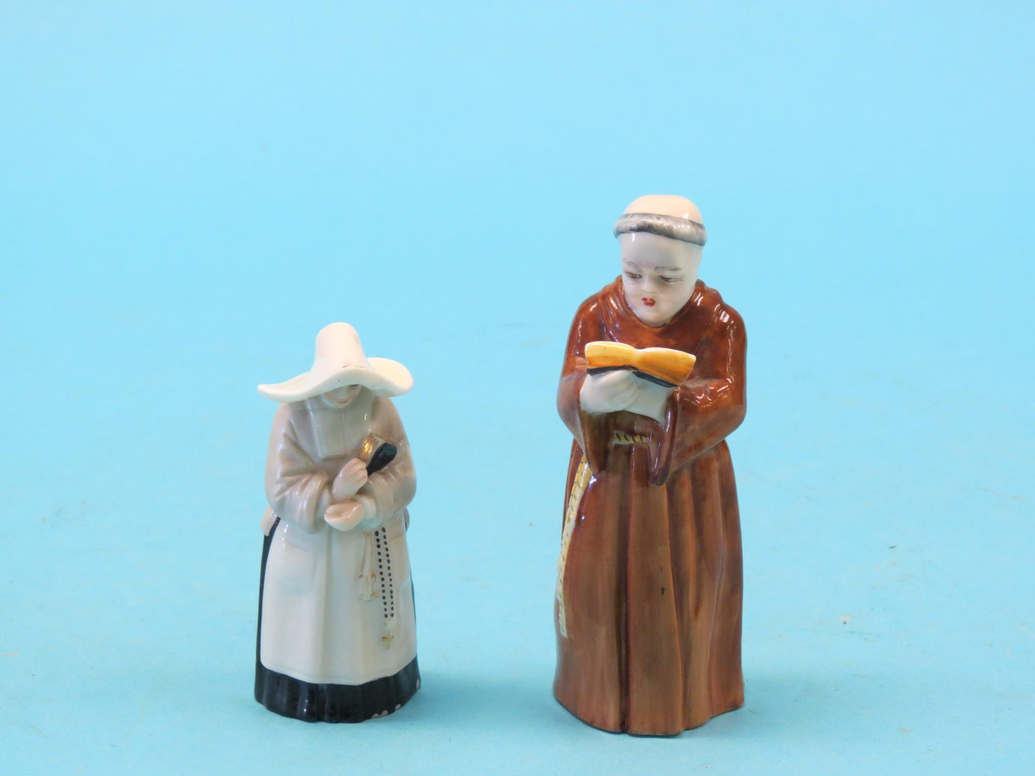 Appraisal: Two Royal Worcester figures monk reading bible in nun with