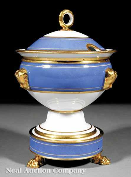 Appraisal: A Paris Porcelain Sauce Tureen c with blue bands and