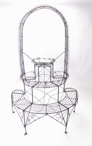 Appraisal: An antique Victorian wire planter round design with trellis top