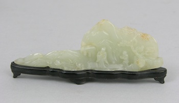 Appraisal: A Carved Nephrite Jade Mountain Chinese Carved white jade mountain