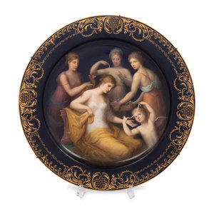 Appraisal: A Vienna Porcelain Charger Early th Century depicting The Adornment