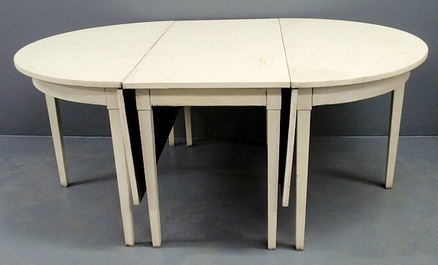 Appraisal: Three-part Swedish dining table painted white with a drop-leaf center