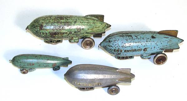 Appraisal: Cast Iron Toys Assortment of Nickel Cast Zeppelins Los Angeles