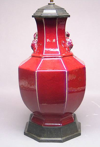 Appraisal: A Chinese flamb red glazed porcelain octagonal-sectioned vase Now drilled