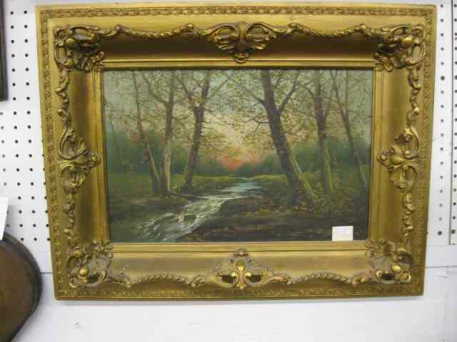 Appraisal: Oil Painting Wooded Stream at Sunset on canvas fancy gold