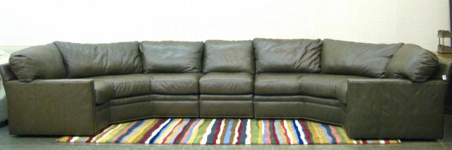 Appraisal: Century three-piece leather sectional sofa with nail-head trim high quality