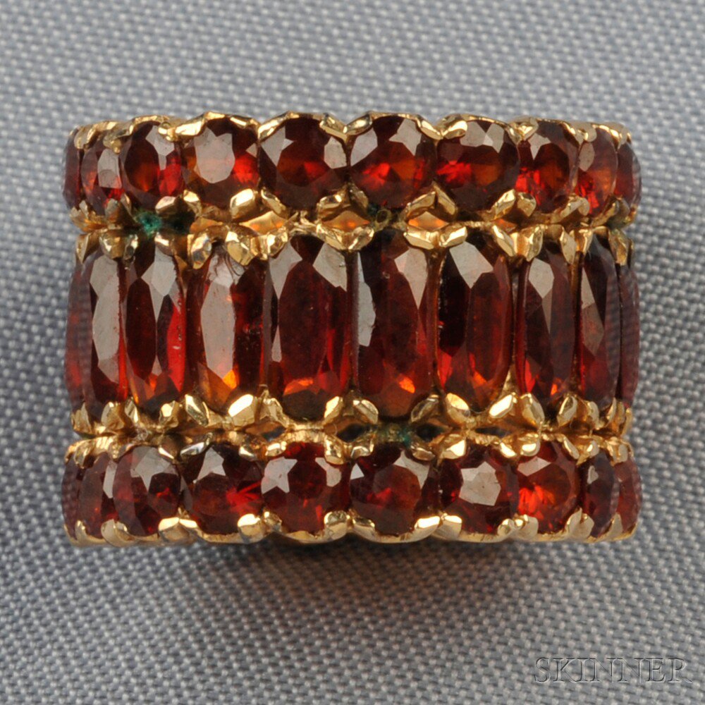 Appraisal: kt Gold and Garnet Band Ring the wide band set