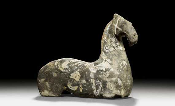 Appraisal: COLD PAINTED TERRACOTTA RELCINING HORSE China Han-Dynasty L cm With