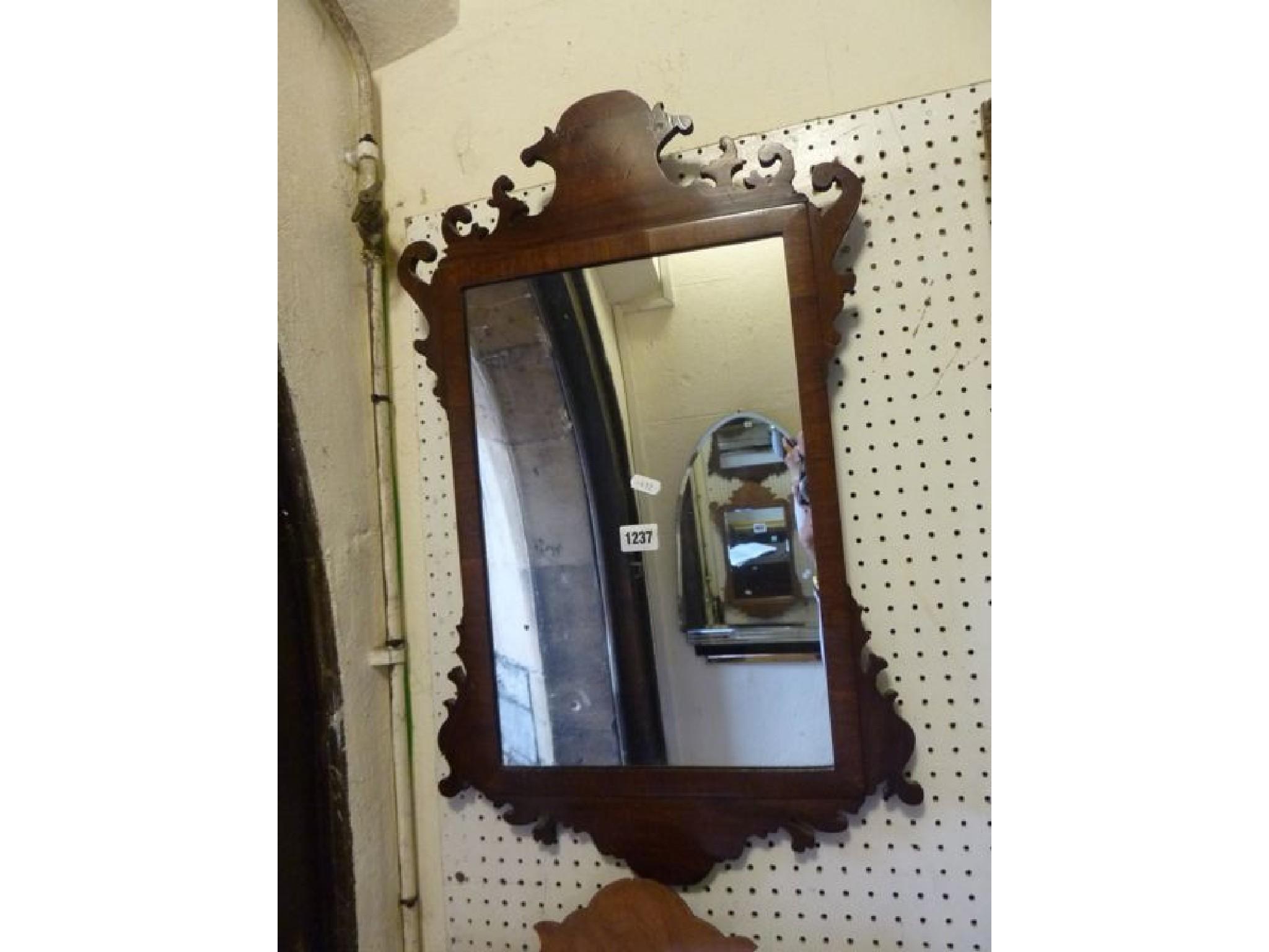 Appraisal: A Georgian style wall mirror with rectangular mirror plate within