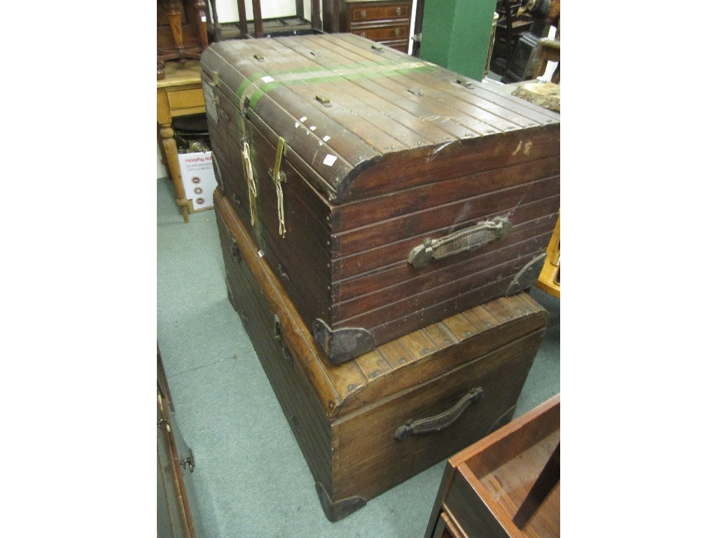 Appraisal: Two large wooden travel trunks