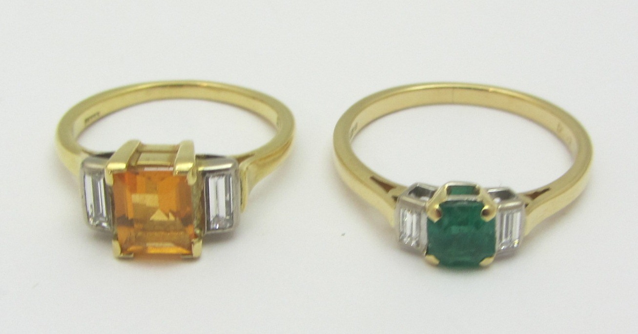 Appraisal: An ct gold emerald and diamond set three stone ring