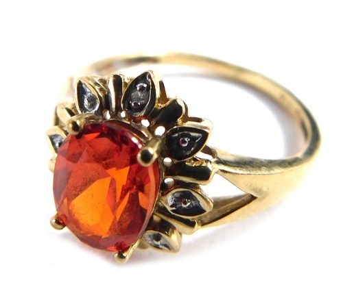 Appraisal: A ct gold topaz and diamond floral cluster ring with