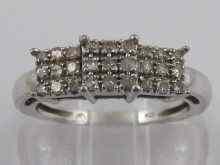 Appraisal: A white gold ring tests ct gold set with small