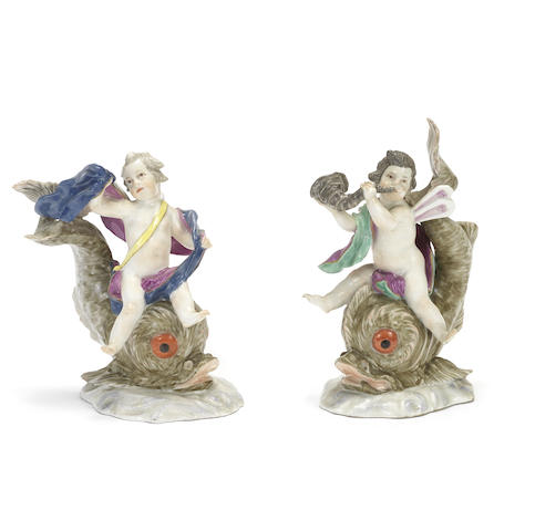 Appraisal: A pair of Meissen figures of putti riding dolphins late