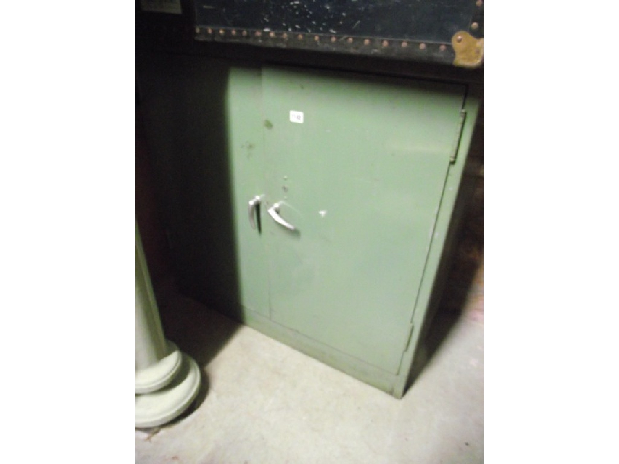 Appraisal: A green painted steel office side cabinet enclosed by a