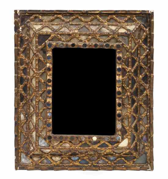 Appraisal: A Spanish Colonial Giltwood Mirror of rectangular form having a